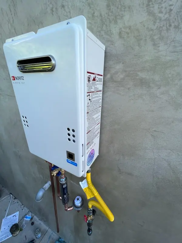Tankless water heater installation for Pender homes